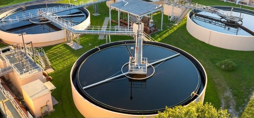 Aerial view of a water treatment plant with clarifier tanks